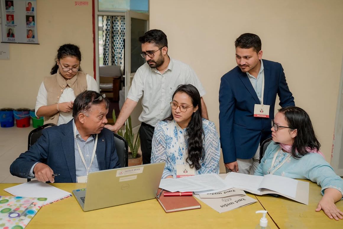 The Aama Surakshya Nepal team planning with partners