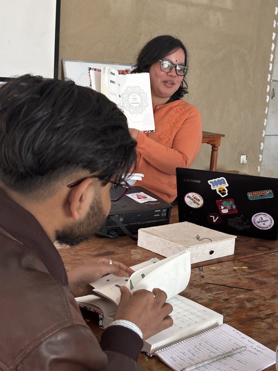 ASN team members reviewing documents at a field office